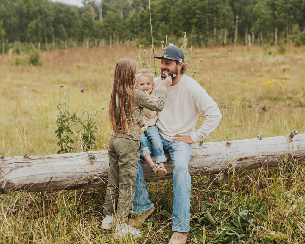 family pictures in a meadow